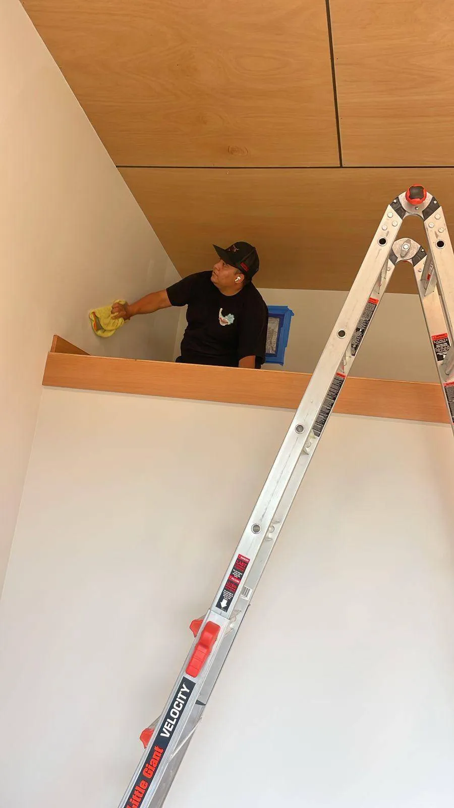 Cleaning a high-ceilinged interior